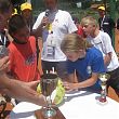 Katie and Alvaro signing the ball from the US Open